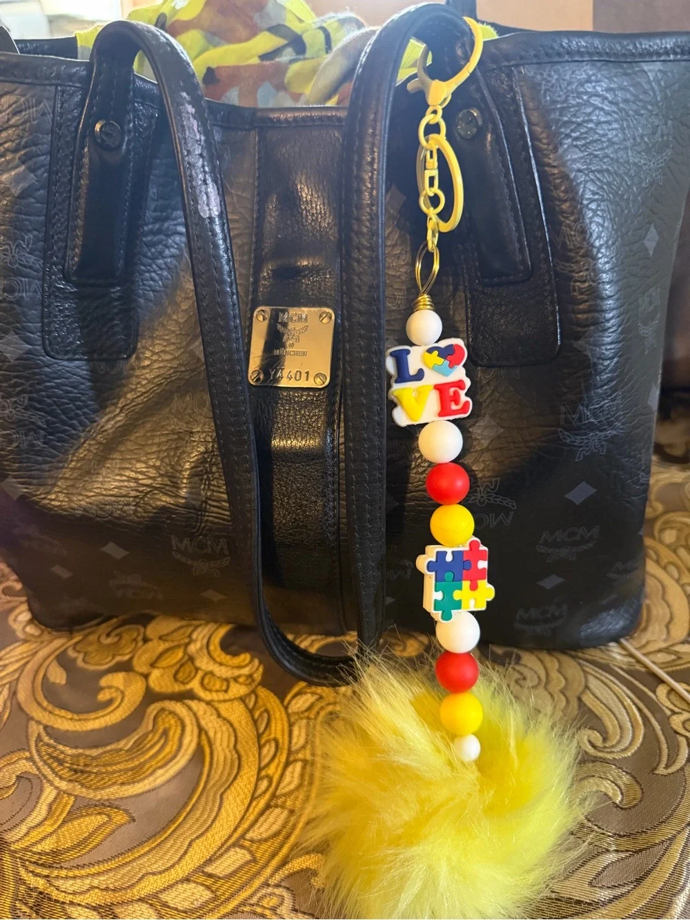 Yellow Pom-Pom Bag Charm with Colorful LOVE Autism Beads